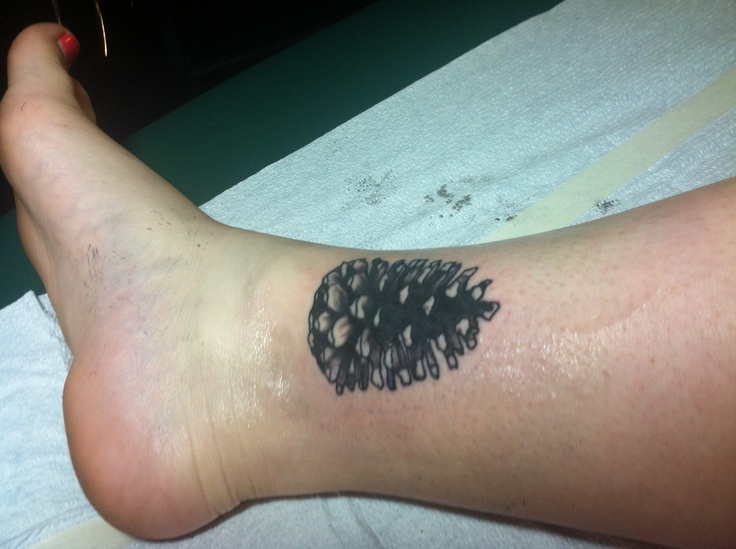 Black Ink  Pine Cone Tattoo On Girl Right Leg