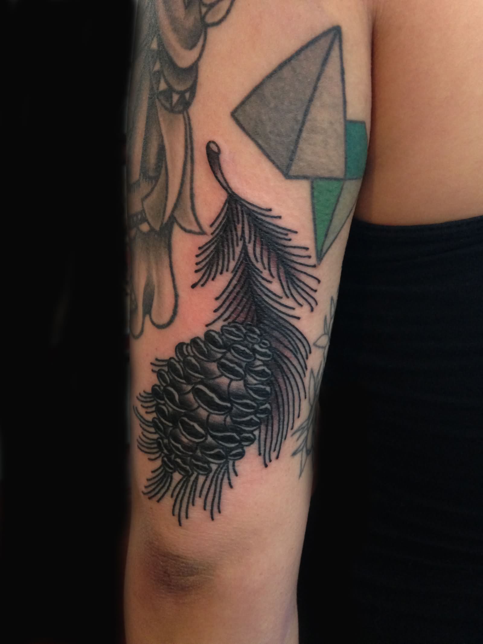 Black Ink Pine Cone Tattoo On Left Half Sleeve
