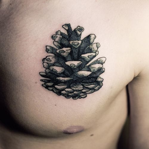 Black Ink Pine Cone Tattoo On Man Left Chest By Ien Levin