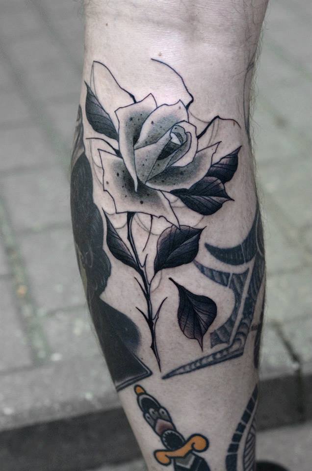 Black Ink Rose Tattoo On Leg Calf