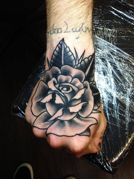 Black Ink Rose Tattoo On Right Hand