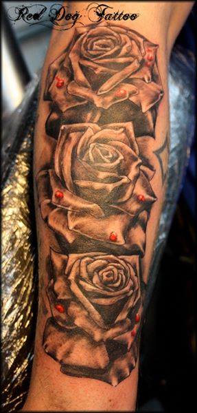 Black Ink Roses Tattoo On Arm