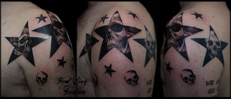 Black Ink Skull In Stars Tattoo On Shoulder