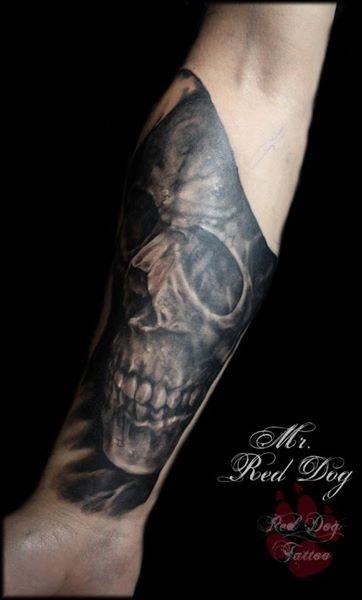 Black Ink Skull Tattoo On Right Forearm