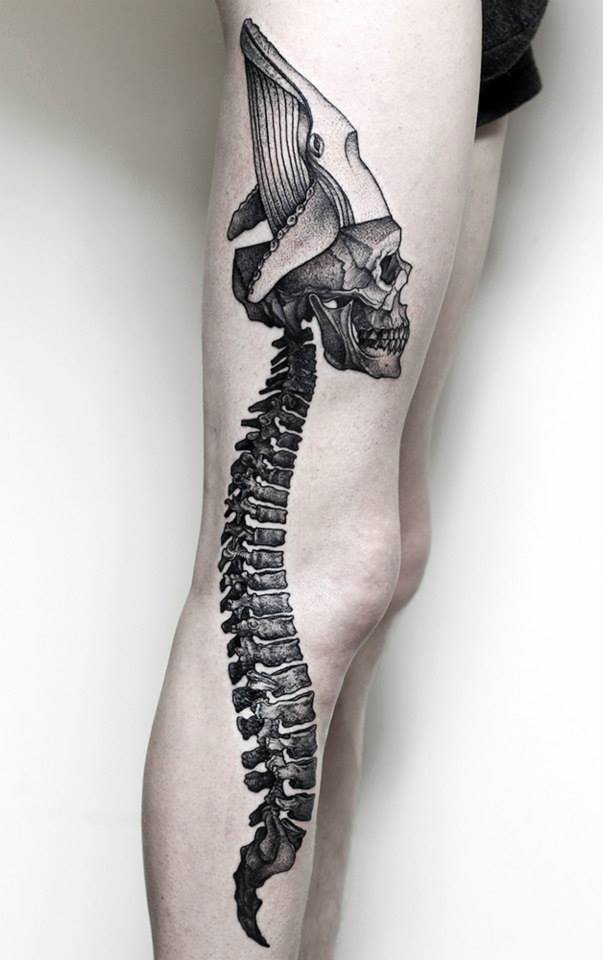 Black Ink Skull With Spine Tattoo On Right Full Leg