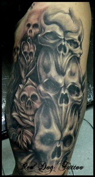 Black Ink Skulls Tattoo Design For Half Sleeve