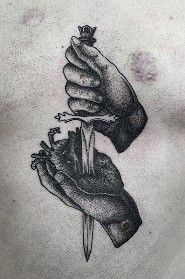 Black Ink Sword In Real Heart Tattoo Design