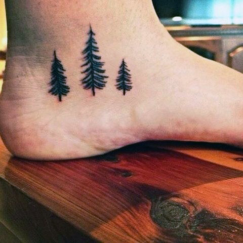 Black Ink Three Pine Tree Tattoo On Right Ankle