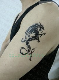 Black Ink Tribal Dragon Tattoo On Man Left Half Sleeve