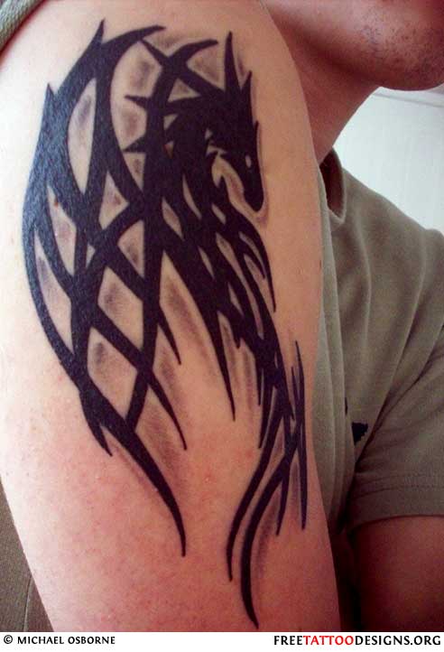 Black Ink Tribal Dragon Tattoo On Right Half Sleeve