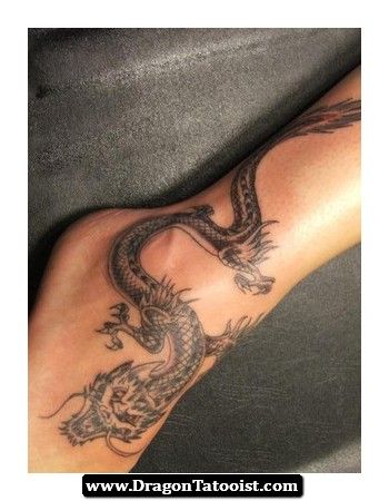 Black Ink Wrap Around Dragon Tattoo On Right Leg