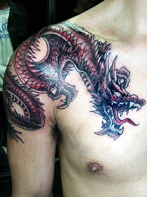 Black Ink Wrap Around Dragon Tattoo On Right Shoulder
