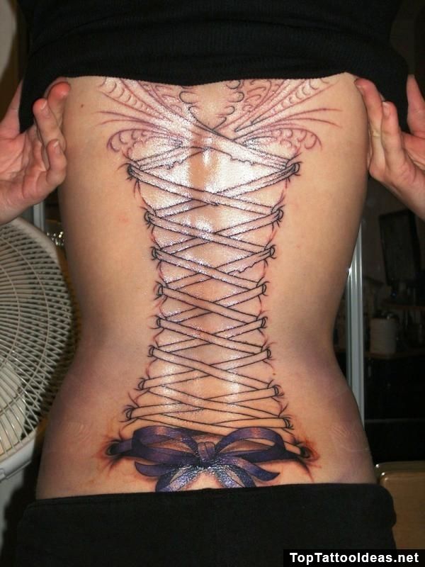 Black Outline Corset With Bow Tattoo On Full Back