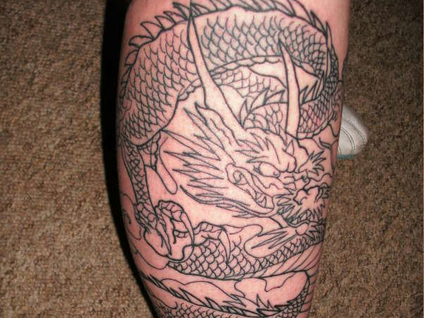 Black Outline Dragon Tattoo On Leg Calf