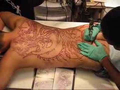 Black Outline Dragon Tattoo On Man Full Back