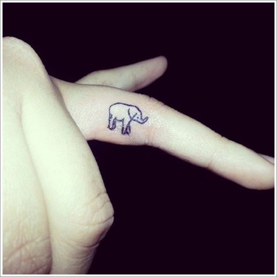 Black Outline Dumbo Tattoo On Left Finger