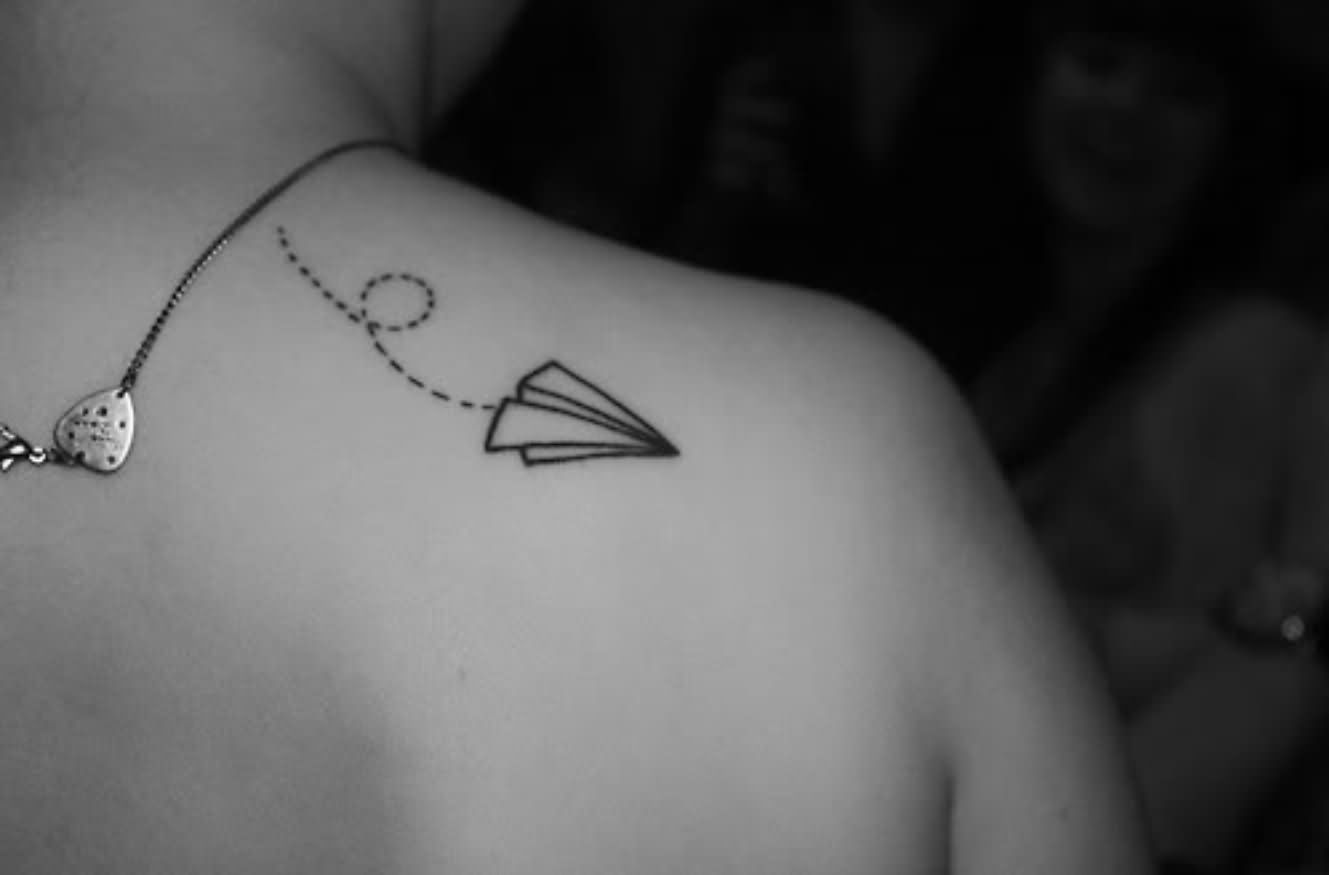 Black Outline Paper Airplane Tattoo On Right Back Shoulder