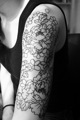 Black Outline Peony Flowers Tattoo On Women Left Half Sleeve