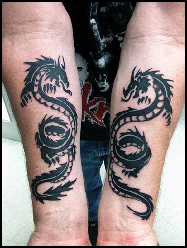 Black Tribal Dragon Tattoo On Both Forearm