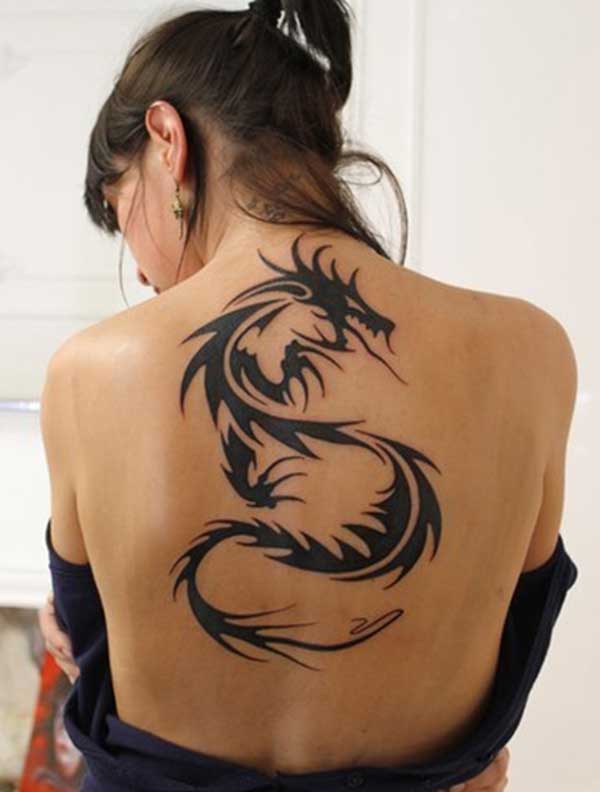 Black Tribal Dragon Tattoo On Girl Upper Back