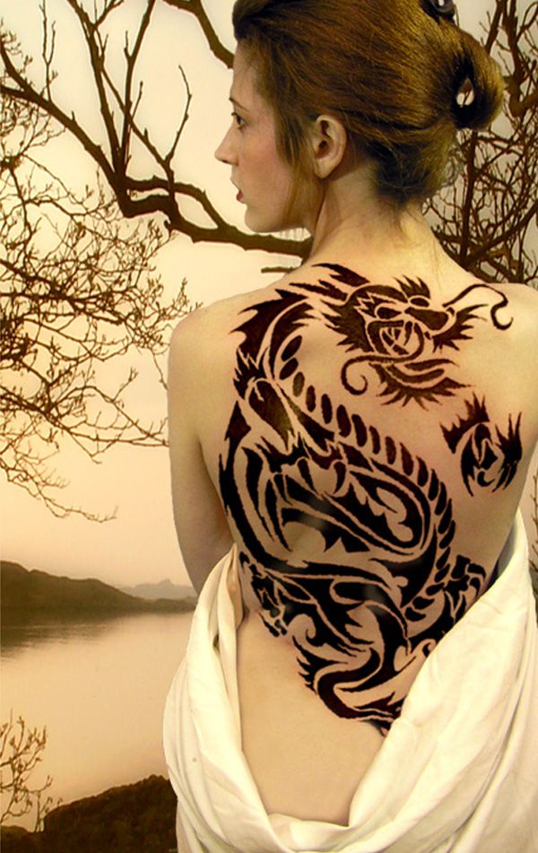 Black Tribal Dragon Tattoo On Women Full Back