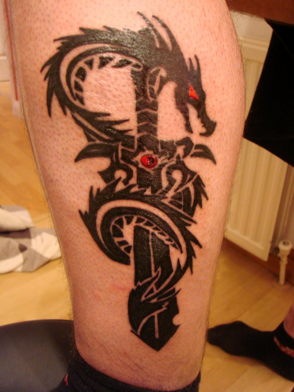 Black Tribal Dragon With Sword Tattoo Design For Leg
