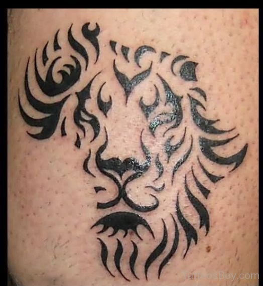 Black Tribal Lion Head Africa Map Tattoo Design For Thigh