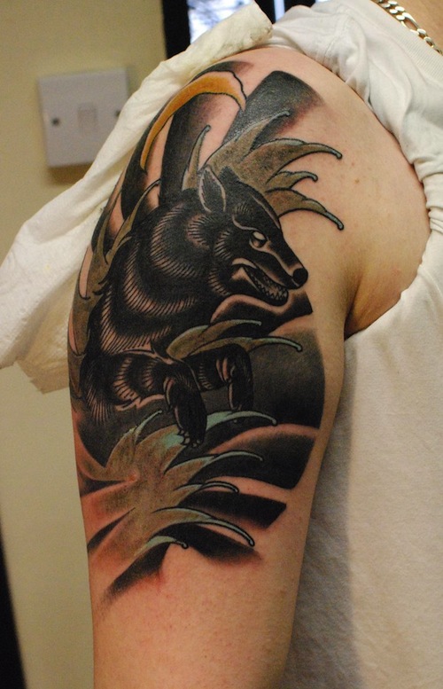 Black Wolf Tattoo On Man Right Shoulder