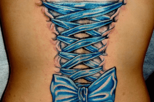 Blue Ink Corset With Bow Tattoo On Back