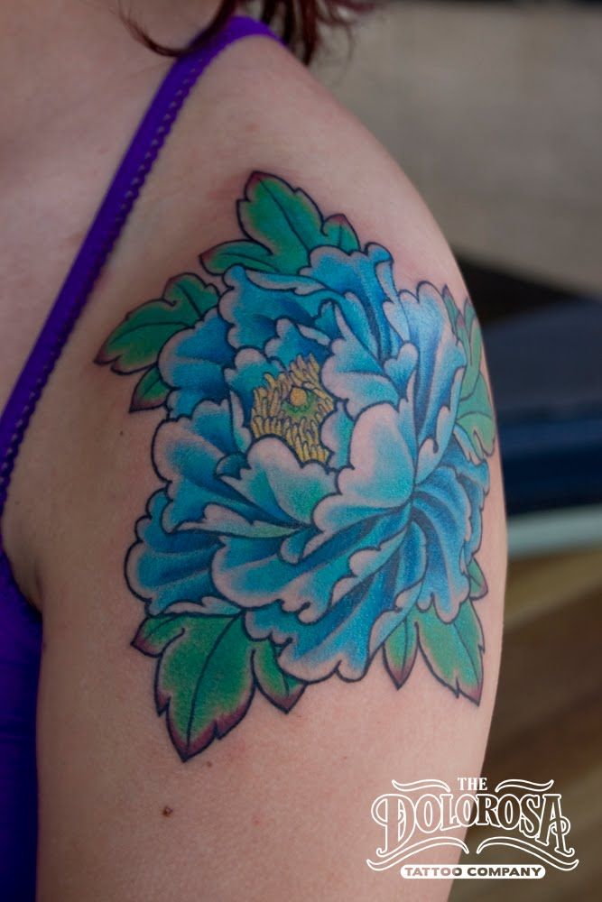 Blue Ink Japanese Peony Flower Tattoo On Women Left Shoulder