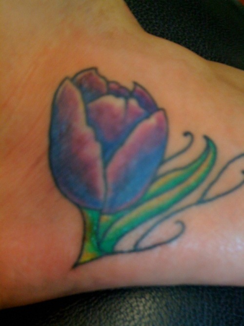 Blue Ink Tulip Tattoo On Foot