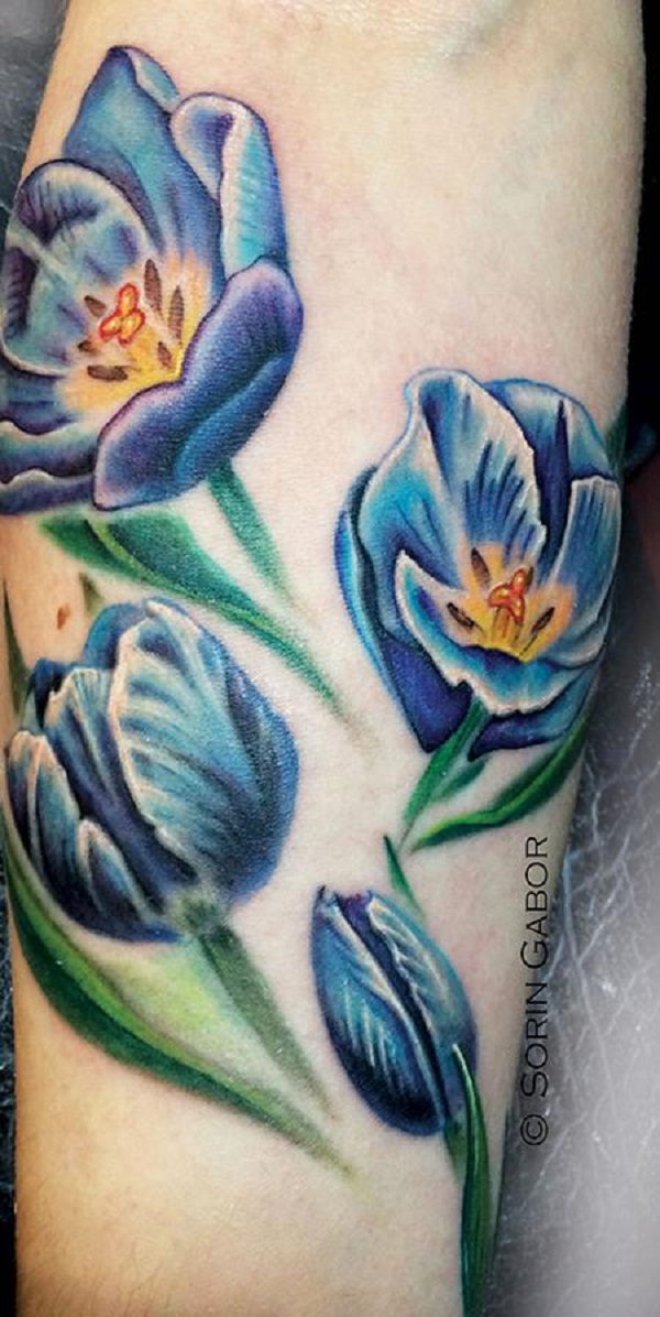 Blue Tulip Flowers Tattoo On Arm