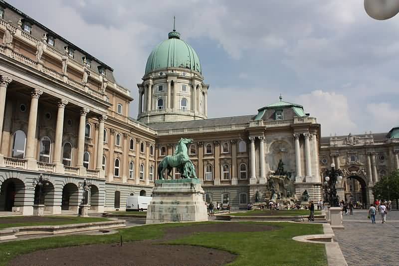 Buda Castle Facade And Statue Of Horseherd At Budapest