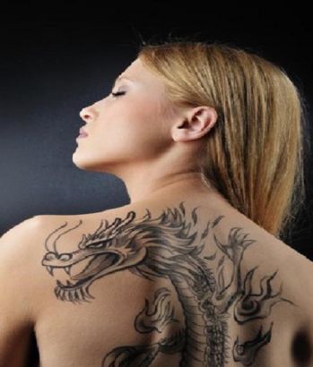 Classic Black Ink Dragon Tattoo On Girl Upper Back