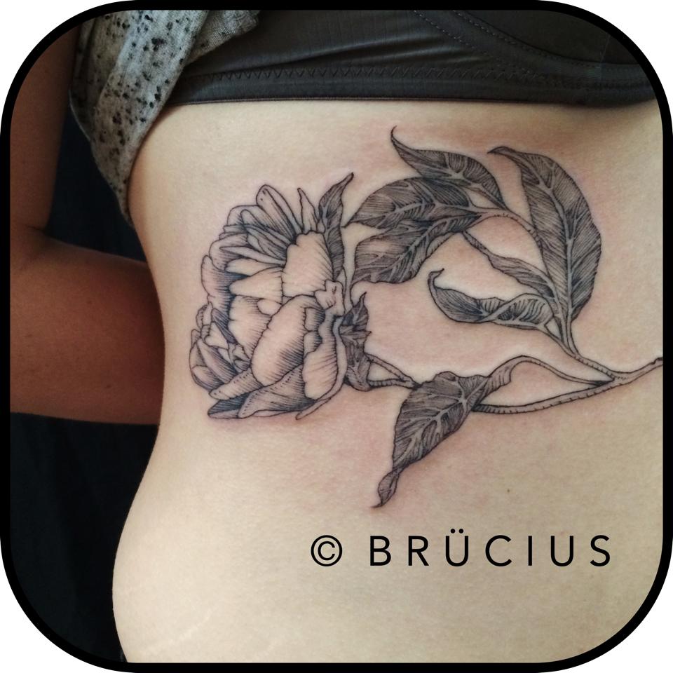 Classic Flower Tattoo On Women Lower Back