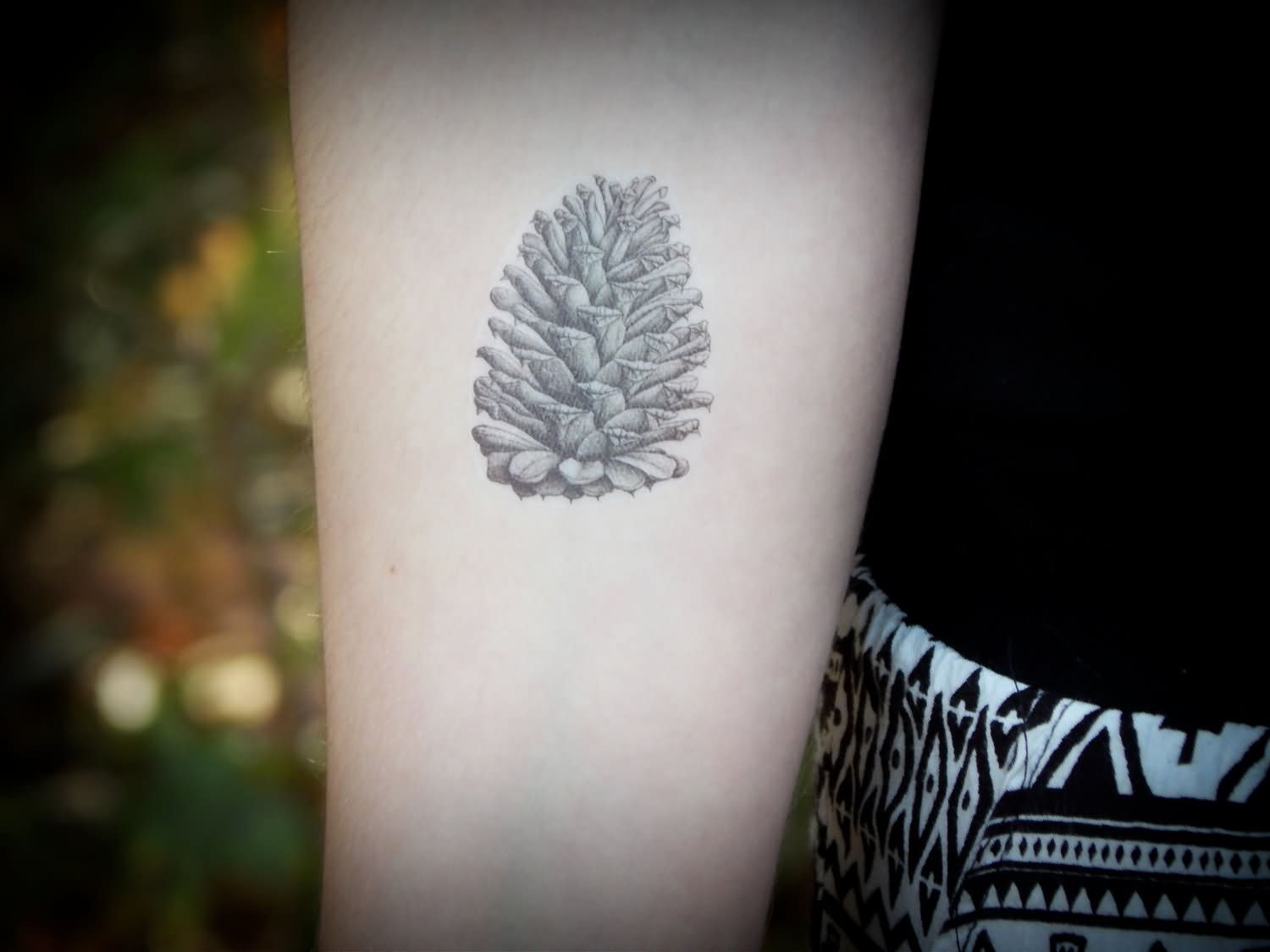 Classic Grey Ink Pine Cone Tattoo On Forearm