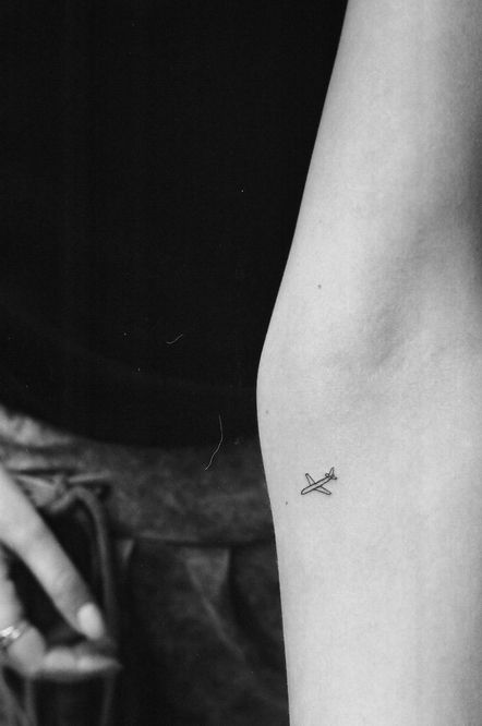Classic Little Airplane Tattoo On Left Forearm