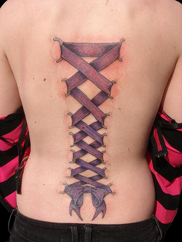Classic Purple Ink Corset With Bow Tattoo On Full Back