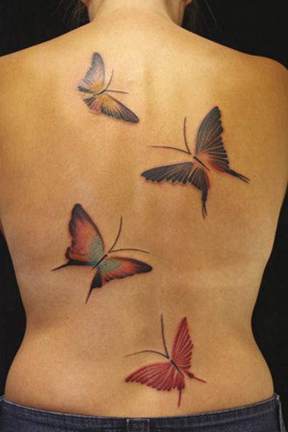 Colored Butterfly Tattoos On Girl Back Body