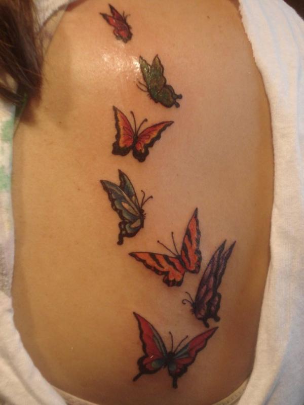 Colored Butterfly Tattoos On Right Back Shoulder