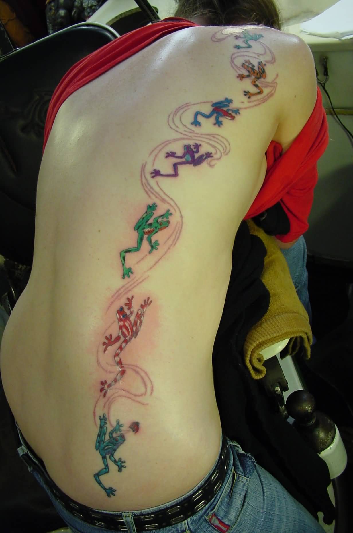 Colored Frog Tattoos On Girl Back