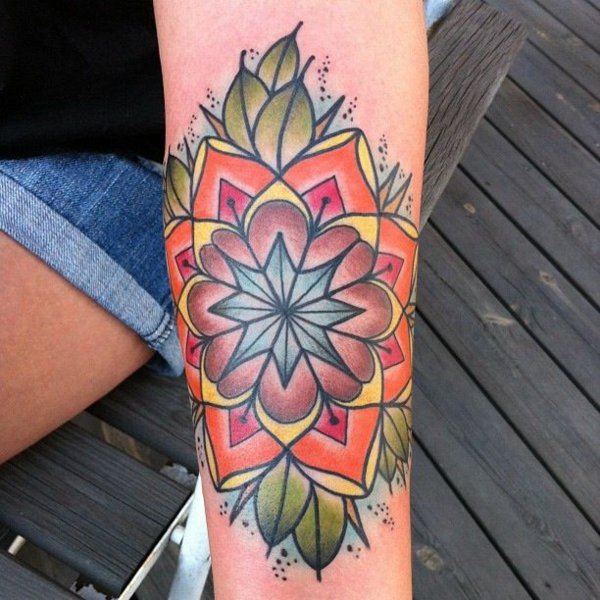 Colored Mandala Flower Tattoo On Left Forearm