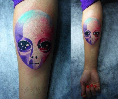 Colorful Abstract Alien Head Tattoo On Forearm