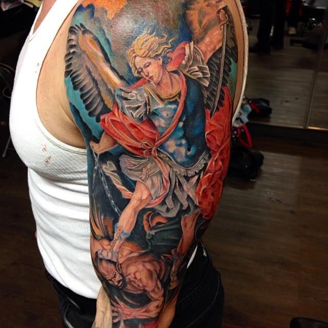 Colorful Archangel Michael Tattoo On Man Left Half Sleeve