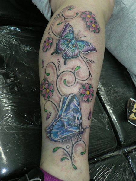 Colorful Butterflies With Flowers Tattoo On Right Leg