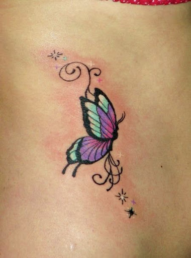 Colorful Butterfly Tattoo On Side Rib