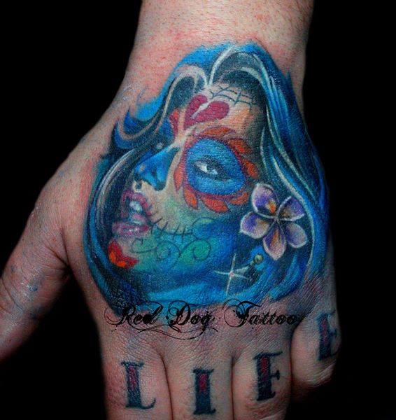 Colorful Dia De Los Muertos Girl Face Tattoo On Left Hand