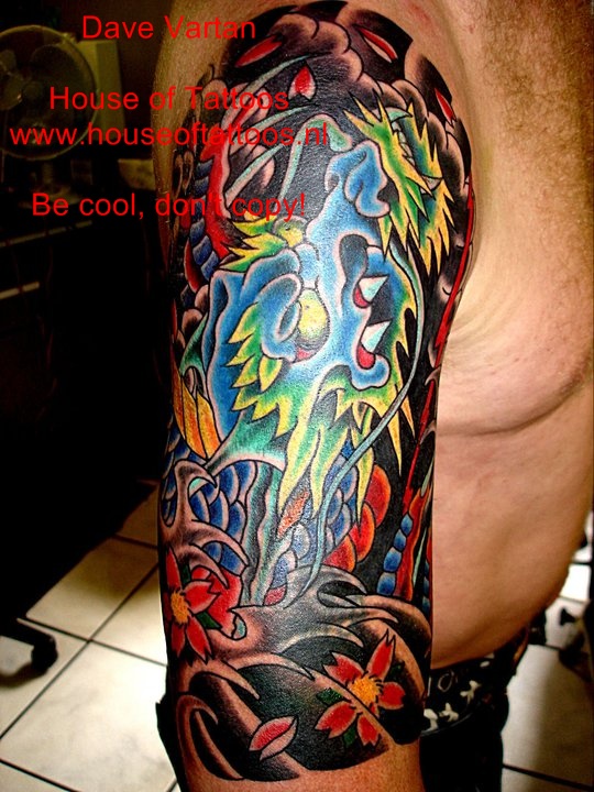 Colorful Dragon Tattoo On Man Right Half Sleeve