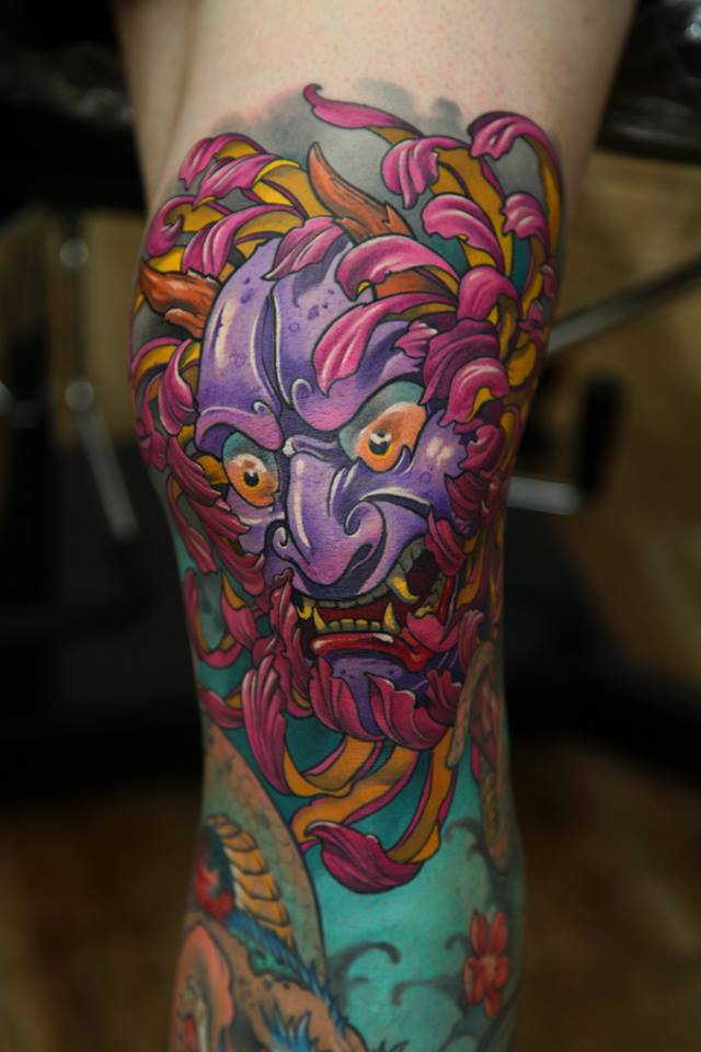 Colorful Hannya Mask Tattoo On Left Leg