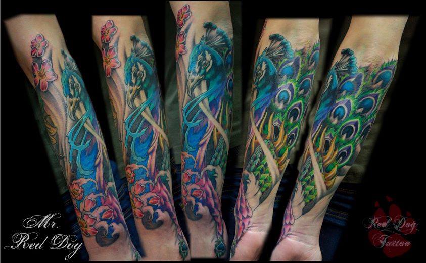Colorful Peacock With Flowers Tattoo On Arm